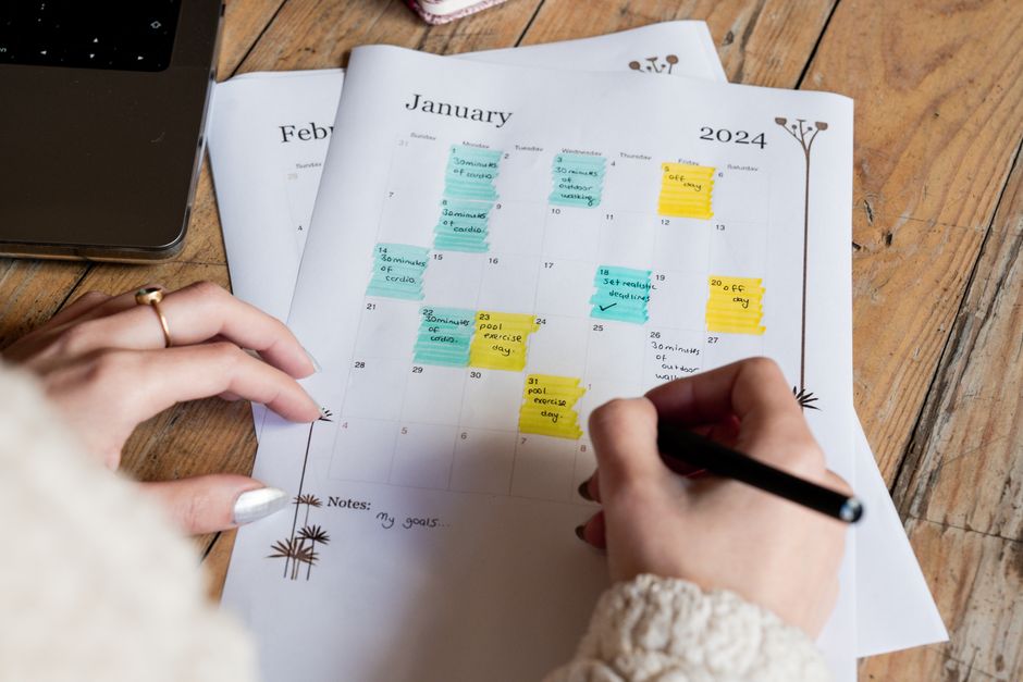 Professional event planner arranging details at a venue